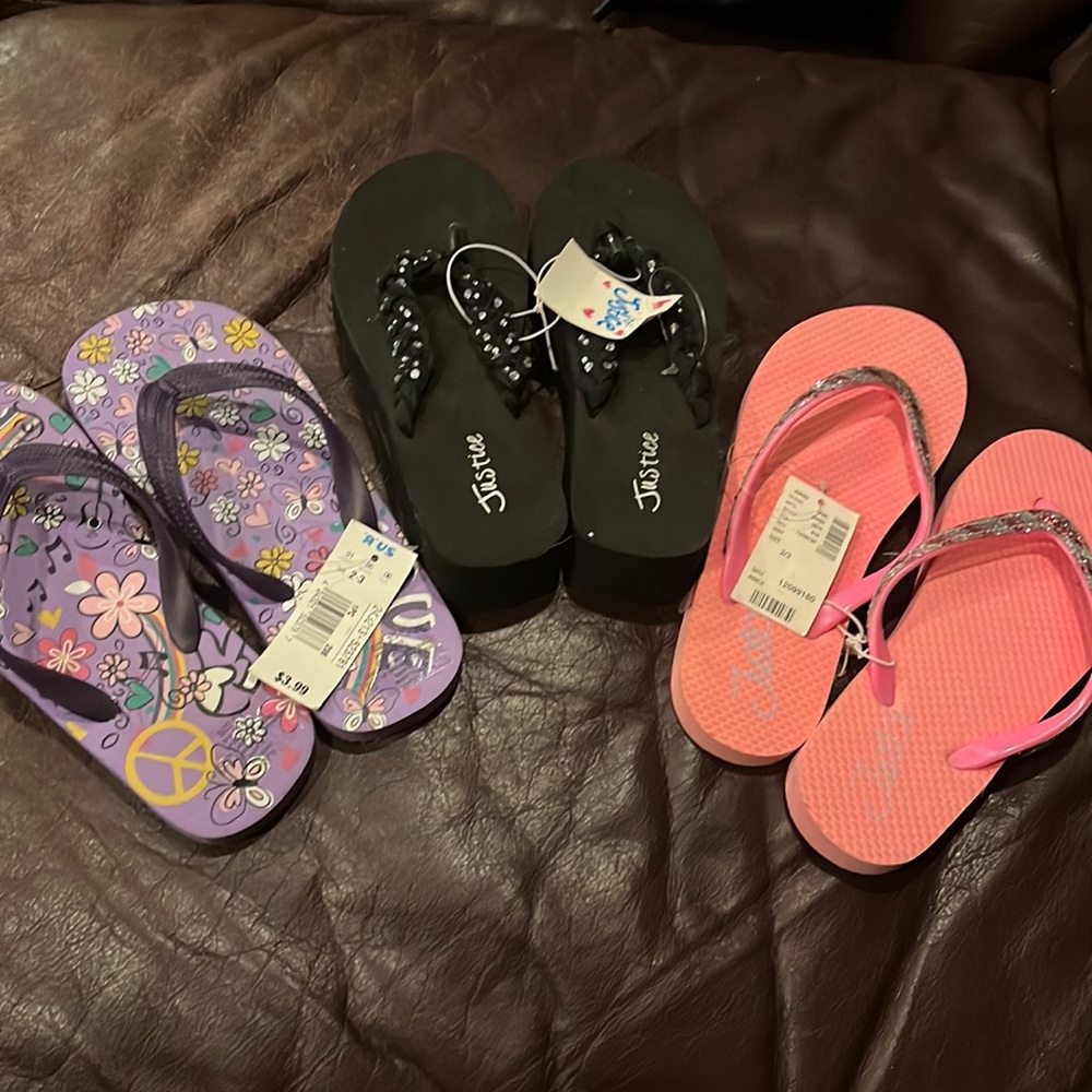 NWT Justice Girls’ Flip Flops. Sizes 2/3. Super cute!
